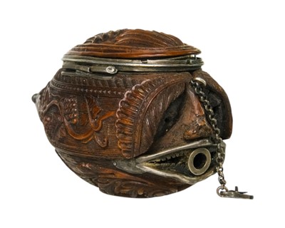 Lot 741 - A charming coquilla nut bugbear snuff box.