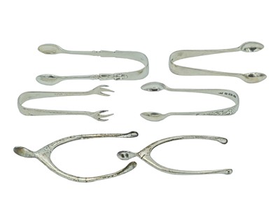 Lot 142 - A selection of silver sugar tongs.