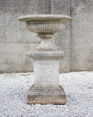 Lot 421 - A large composition stone garden urn.