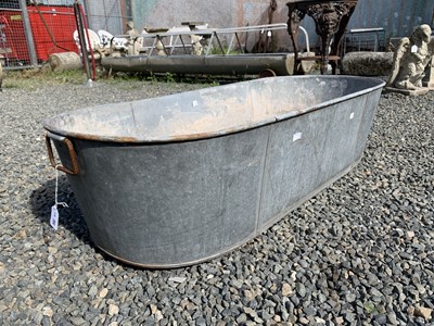 Lot 61 - A galvanised tin bath. 48cm x 118cm. maximum