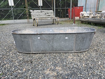 Lot 61 - A galvanised tin bath. 48cm x 118cm. maximum