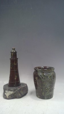 Lot 63 - A Serpentine Lighthouse and Vase. The...