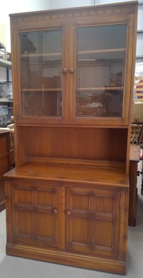 Lot 12 - A Vintage Ercol Sideboard Bookcase. 197cm tall,...