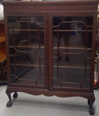 Lot 48 - A Glazed Oak Bookcase. 131cm tall, 107cm wide...