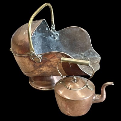 Lot 58 - A copper and brass coal scuttle and a kettle.