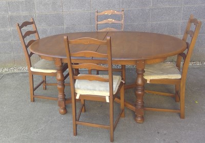 Lot 9 - A Vintage Ercol Old Colonial, extending Dining...