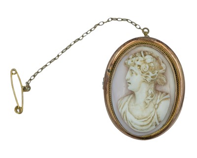 Lot 444 - A Victorian 9k rose gold mounted oval shell cameo brooch.