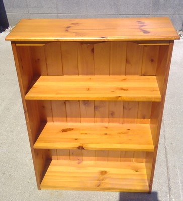 Lot 53 - A Pine Bookcase, 105cm tall, 76cm wide and...