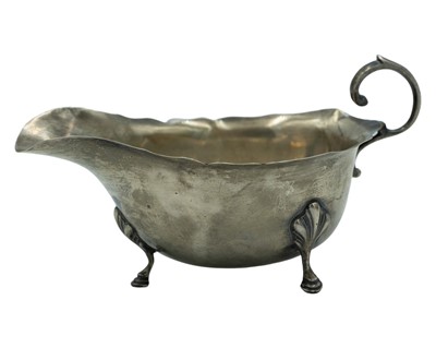 Lot 101 - A silver sauce boat by William Greenwood & Sons.