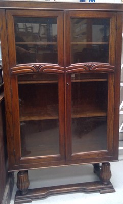 Lot 45 - An Oak Glazed Bookcase. 141cm tall, 84cm wide...