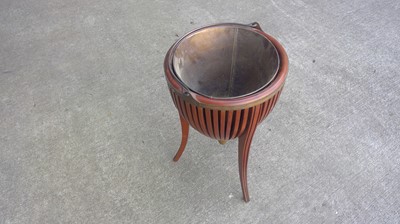Lot 21 - A Regency-style mahogany Jardiniere with a...