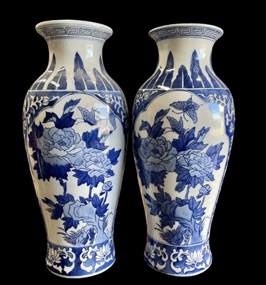 Lot 97 - A pair of Chinese blue and white baluster...