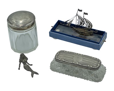 Lot 369 - Two silver-lidded cosmetic jars.