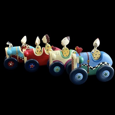 Lot 150 - Four wooden Roger Copple for "The Hero...