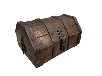 Lot 171 - A wooden jewellery chest containing two...