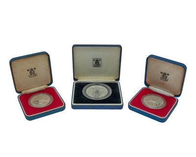 Lot 17 - Three QEII Royal Commemorative .925 silver proof crown coins, cased with certificates.
