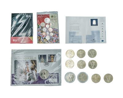 Lot 18 - GB - A collection of 11 QEII £5 special issue crown coins, a 2013 definitive coin set, and a 2012 coin set.