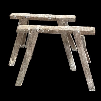 Lot 214 - Two wooden saw horses, 76cm long and 59cm high.
