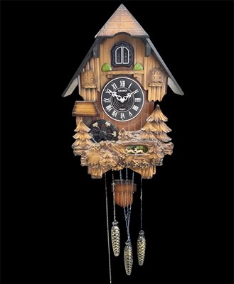 Lot 220 - A vintage-style quartz cuckoo clock by Kaiser;...