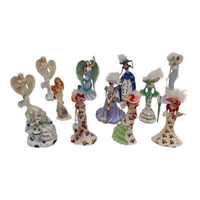 Lot 225 - A collection of resin and ceramic figures,...