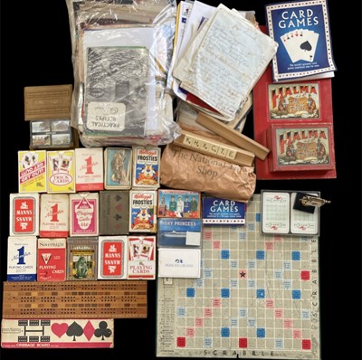 Lot 238 - A selection of playing cards, games and...