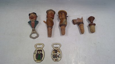 Lot 29 - Four Wooden Bottle Stoppers, a Wooden Bottle...