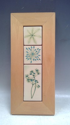 Lot 28 - Three Emma West Tiles in a Pine Frame, the...