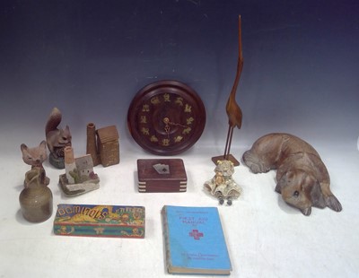 Lot 91 - A Cornish Zodiac Clock, a Wooden Bird and Dog,...