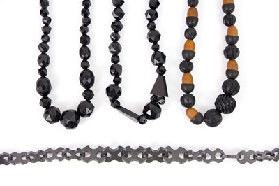 Lot 396 - A graduated jet pocket watch chain.