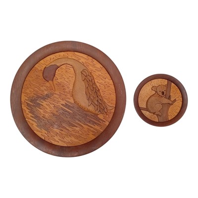Lot 44 - Two intricate wooden jigsaw puzzles featuring...