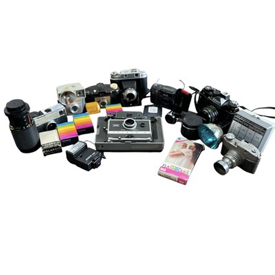 Lot 101 - A selection of vintage cameras and accessories.