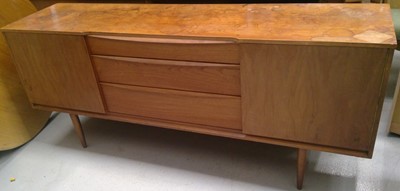 Lot 35 - A Mid-century Teak Sideboard, 77cm tall, 183cm...
