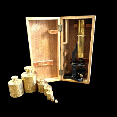 Lot 41 - A vintage boxed field microscope and a set of...