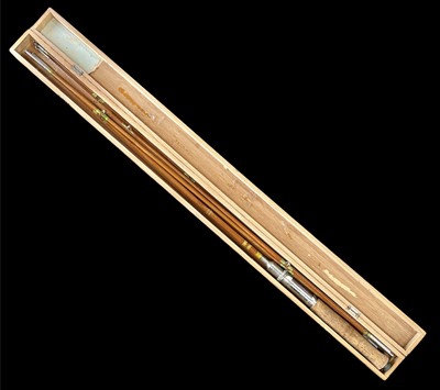 Lot 111 - A vintage split cane fishing rod with extra...