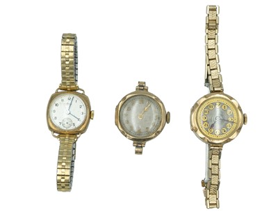 Lot 415 - Three ladies 9k cased manual wind wristwatches.
