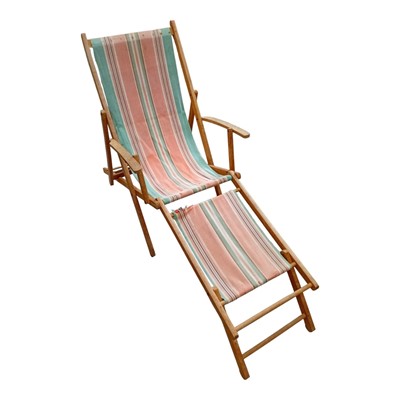 Lot 108 - A Vintage beach chair with a foldout footstool.