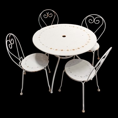 Lot 40 - A vintage Wrought Iron patio set with four...