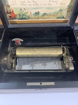 Lot 199 - A Late 19th century Swiss cylinder music box,...