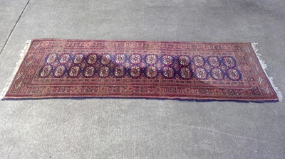 Lot 133 - A Machine Made Runner, 238cm by 80cm.
