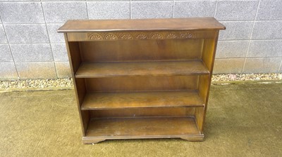 Lot 154 - An Oak Carved Bookcase, 94cm tall, 99cm wide...
