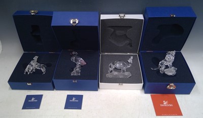 Lot 200 - Four Swarovski Figures. Lion, Flamingo, Horses...