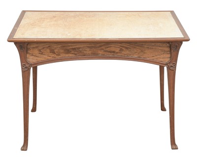 Lot 374 - An Art Nouveau style mahogany writing table, in the style of Edward (Edouard) Colonna.