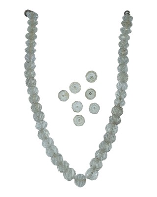 Lot 466 - A faceted rock crystal graduated bead necklace with silver spring clasp.