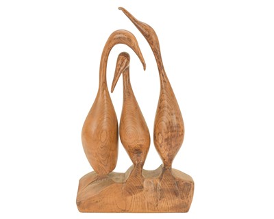 Lot 265 - A carved elm bird group sculpture.
