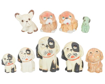 Lot 326 - A graduated set of four Crown Devon Bonzo dogs.