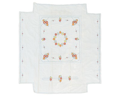 Lot 221 - An embroidered linen bedspread with cutaway corners.