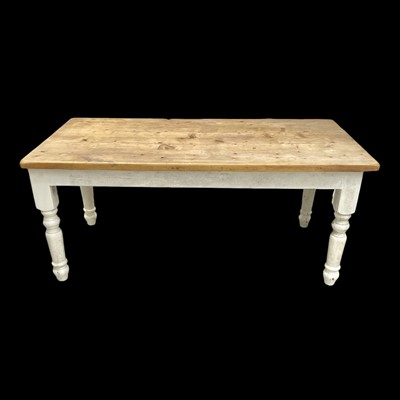 Lot 5 - A substantial pine kitchen table with painted...
