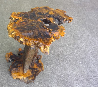Lot 1 - A Cornish live edge wooden table. 66cm tall,...
