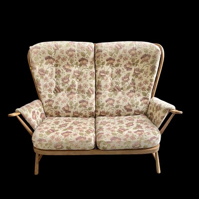 Lot 4 - A vintage Ercol "Evergreen" two-seater sofa,...