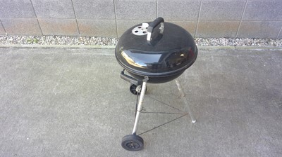 Lot 16 - A Weber Kettle Barbecue, 76cm tall by 47cm in...